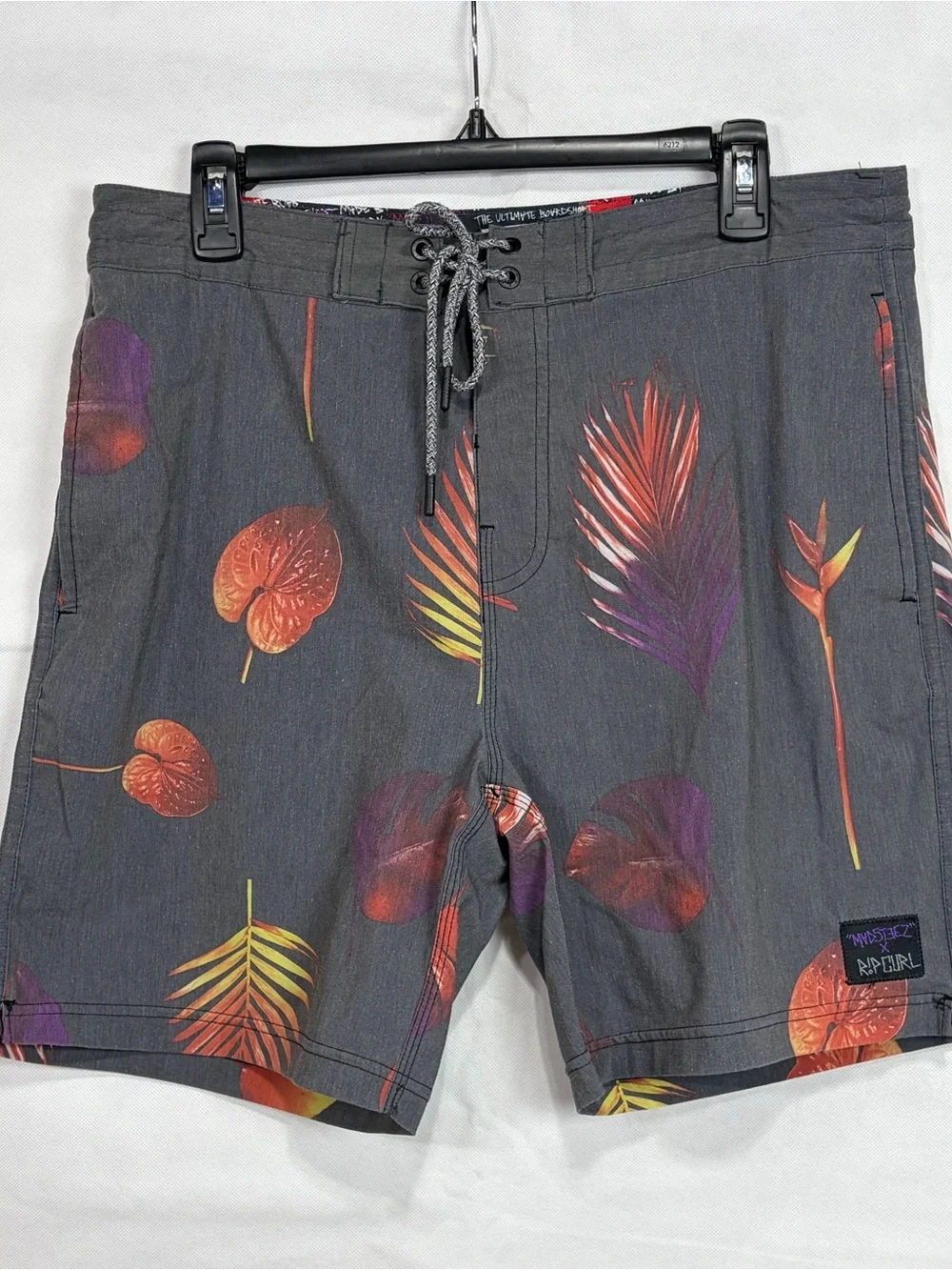 Rip Curl Gray Board Shorts with Orange and Purple Tropical Print